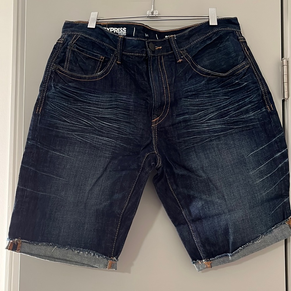 Express men’s cut off denim shorts. Size 34 slim. Color dark denim. Gently worn.